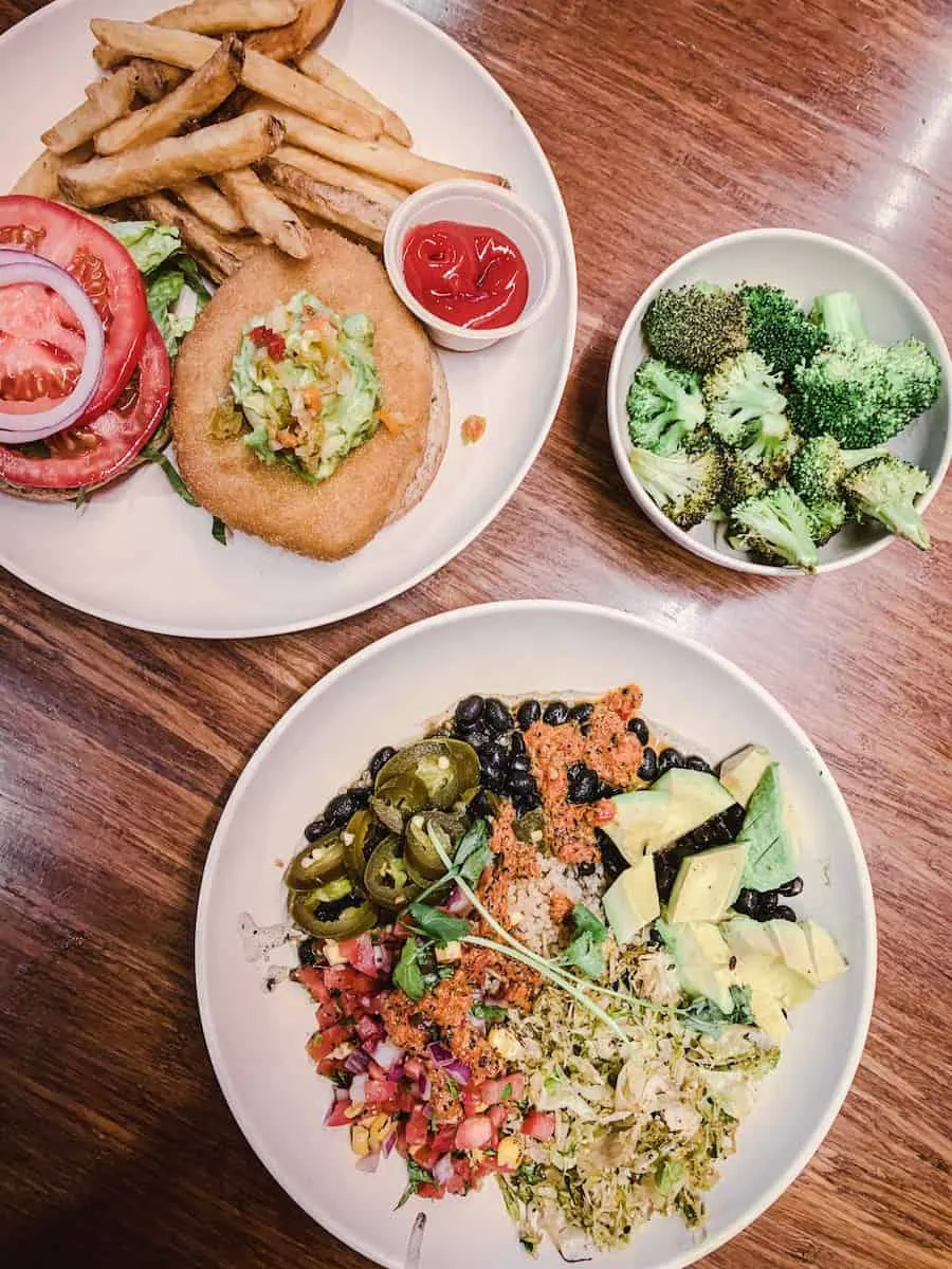 My Favourite Vegan restaurants in Seattle - Vancouver with Love. Image of Chicken Burger and Mexican Bowl from Veggie Grill.