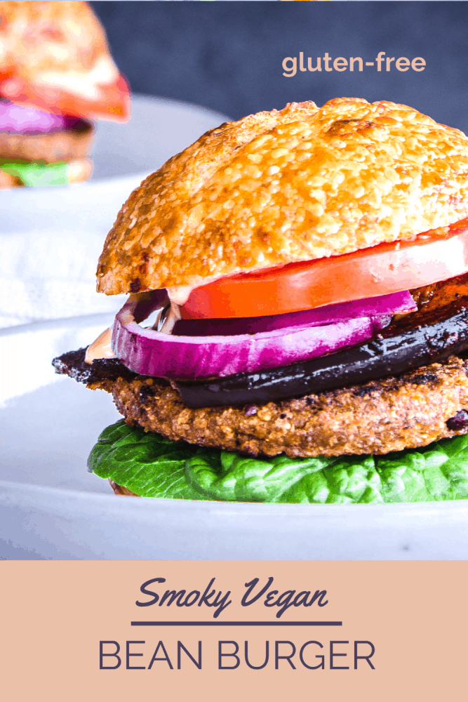 Looking for a simple bean burger recipe? These Smoky Vegan Bean Burgers smother Hilary's Eat Well Adzuki Bean Burgers in homemade garlic mayo and smoky eggplant strips. The recipe is easy and quick to make, and is totally vegan, dairy-free and gluten-free. Perfect for summer grilling ideas. #grilling #burger #beanburger #vegan #glutenfree #dairyfree