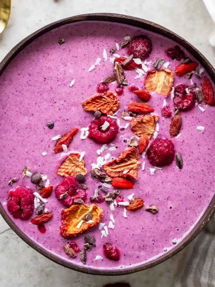 Pink No Banana Berry Smoothie Bowl decorated with freeze-dried berries.