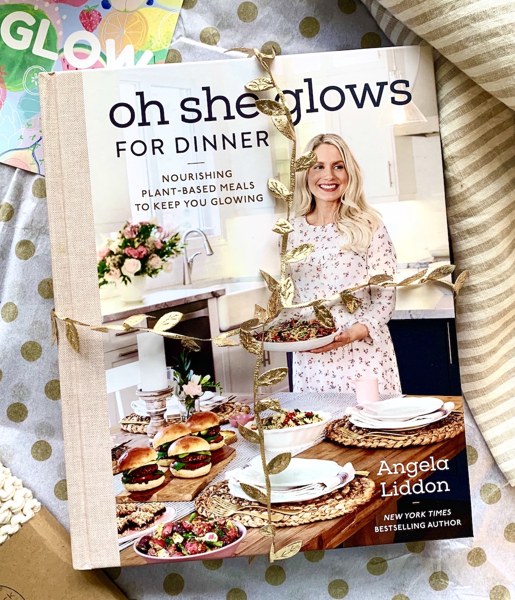 Image shows copy of 'Oh She Glows for Dinner' cookbook by Angela Liddon.