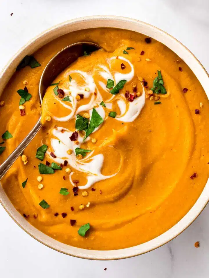Easy lentil and carrot soup with a spoon.
