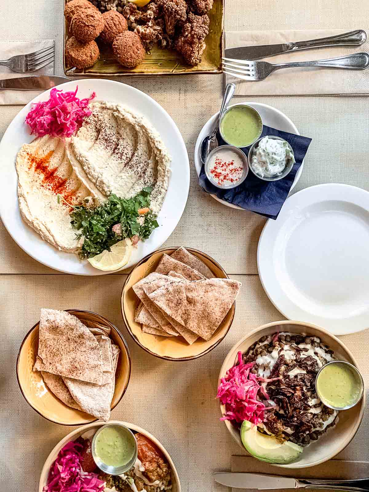 Table spread of vegan food from a local restaurant.