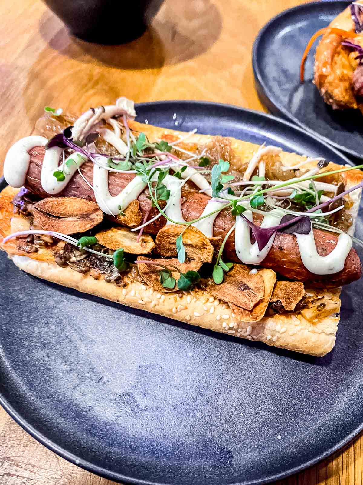 25 Best Vegan Restaurants in Vancouver BC for 2023 - Hot dog from Good Dogs Plant Foods