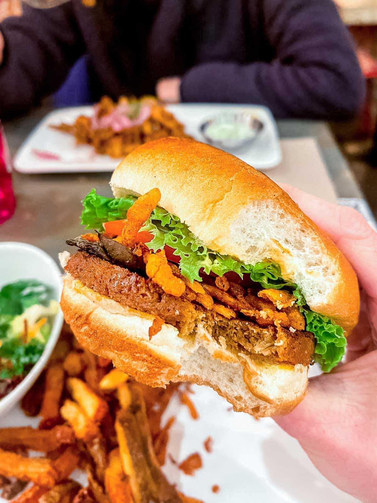 25 Best Vegan Restaurants in Vancouver BC for 2023 - burger with fries from MeeT