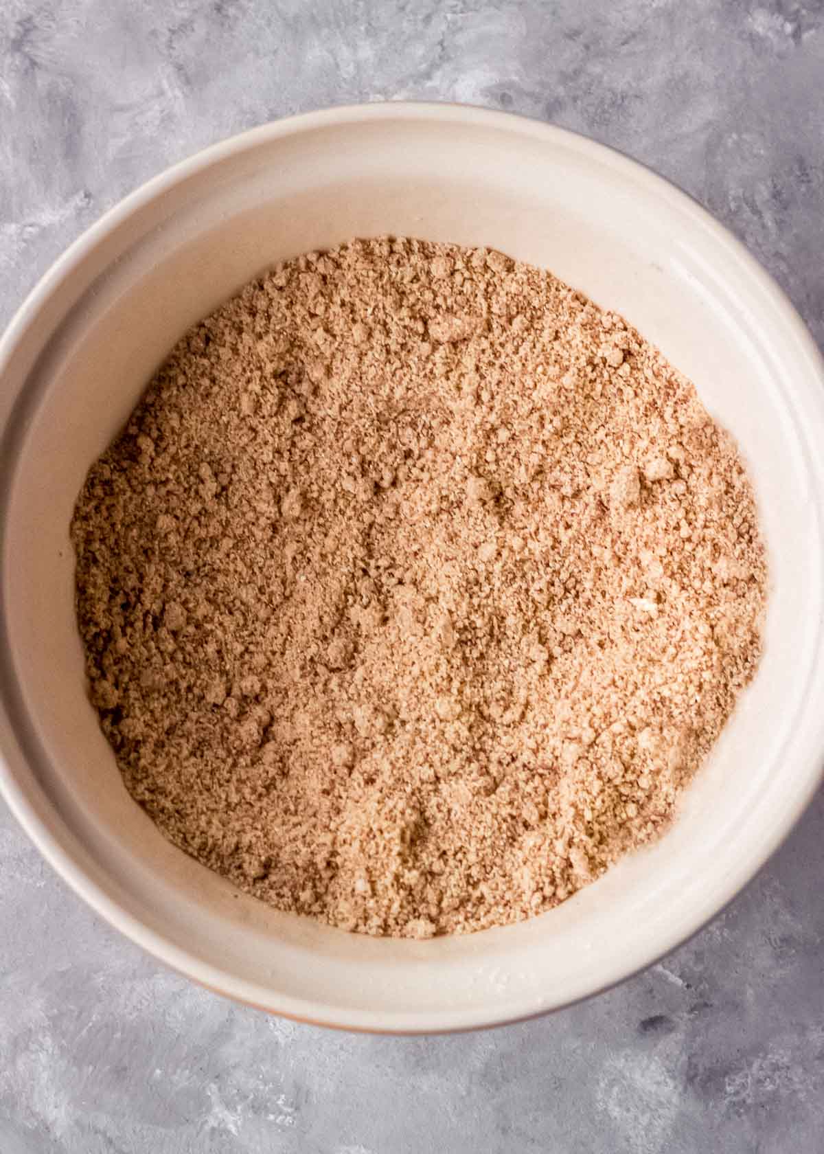 Mince pie pastry mixture sits in a large mixing bowl.