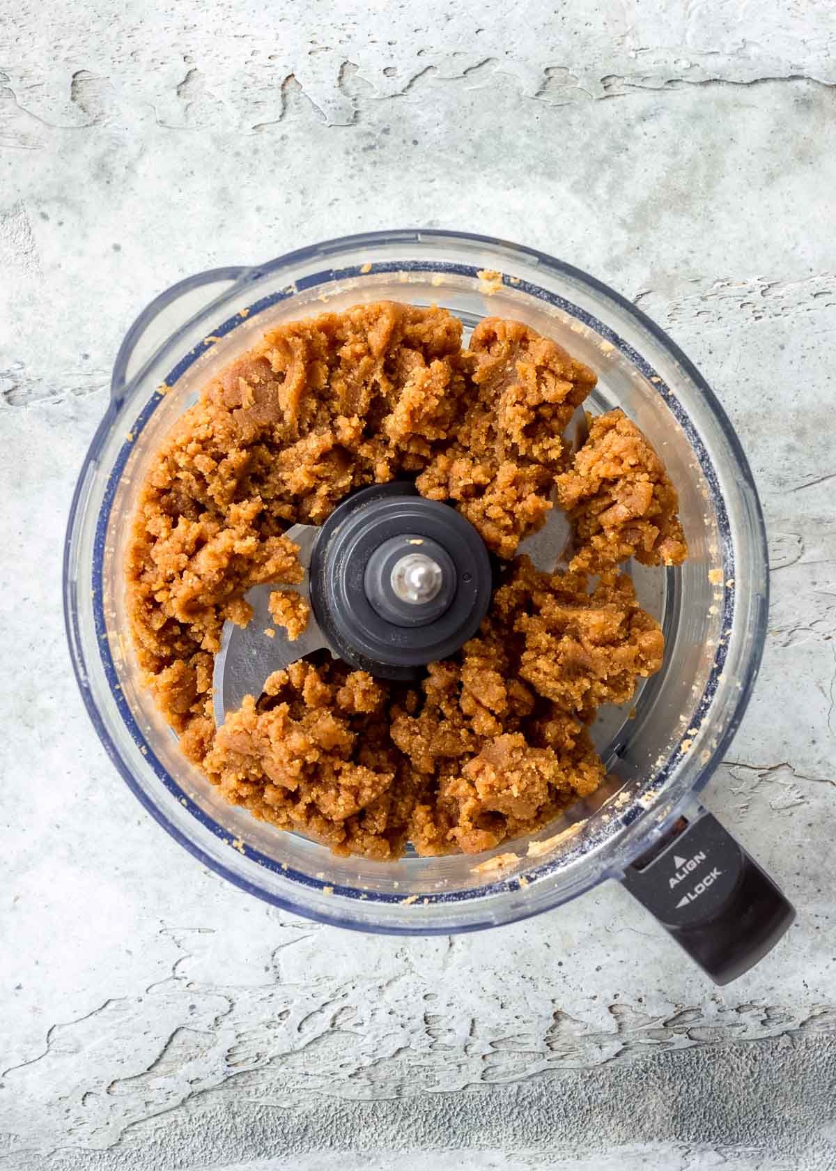 Peanut butter and dates combined together in a food processor.